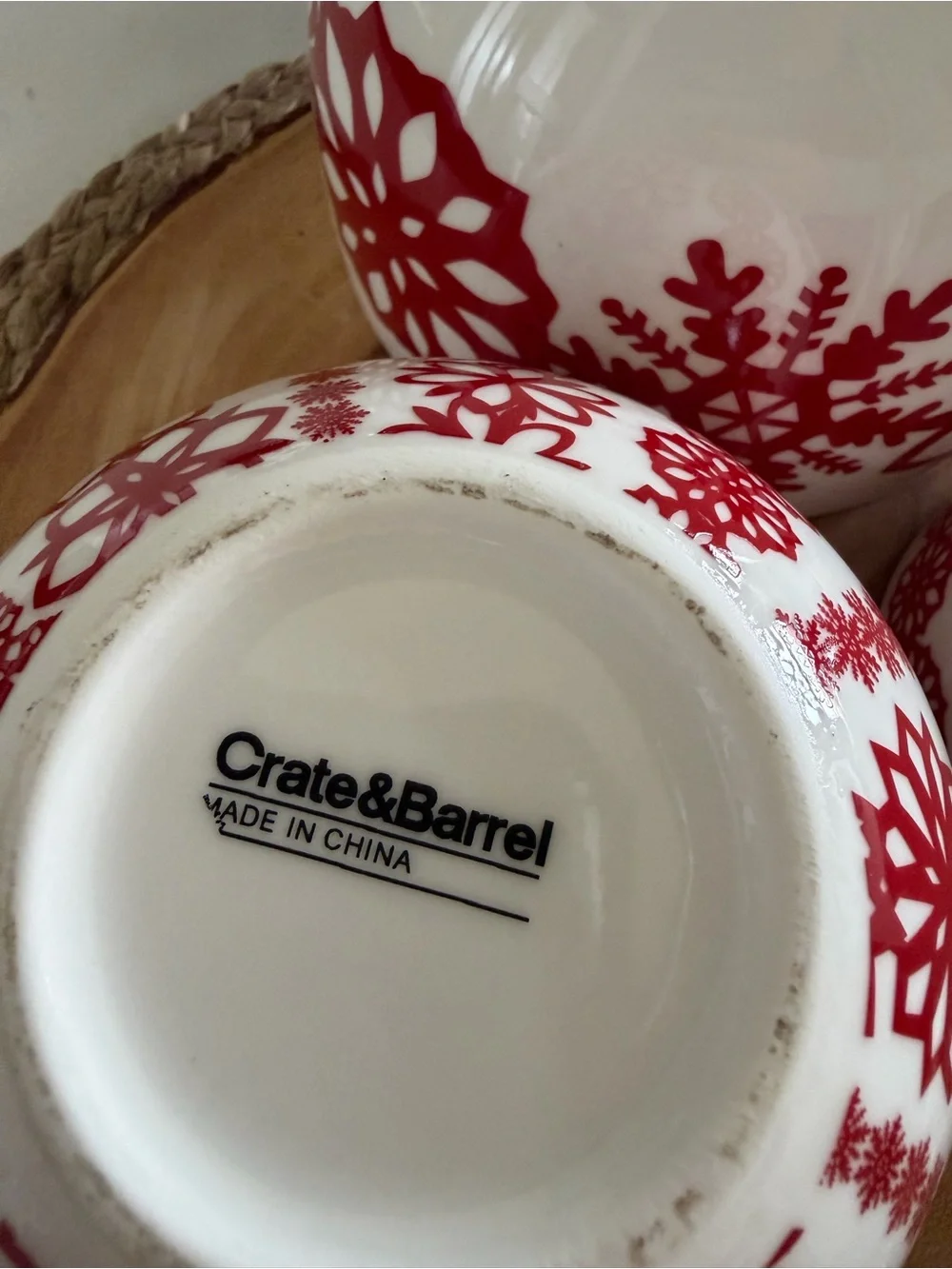 Crate & Barrel Kate Forrester White Ceramic Nesting Bowl Set with Red Snowflakes